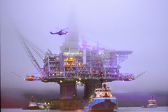 The Hibernia offshore oil production platform being towed to the oil fields 315km from St. John's on the Grand Banks of Newfoundland.
Photo by Greg Locke (C) 2006 www.greglocke.com
Film scan