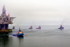 The Hibernia offshore oil production platform being towed to the oil fields 315km from St. John's on the Grand Banks of Newfoundland.
Photo by Greg Locke (C) 2006 www.greglocke.com
Film scan