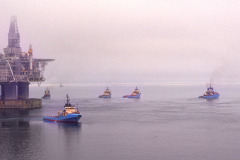 The Hibernia offshore oil production platform being towed to the oil fields 315km from St. John's on the Grand Banks of Newfoundland.
Photo by Greg Locke (C) 2006 www.greglocke.com
Film scan